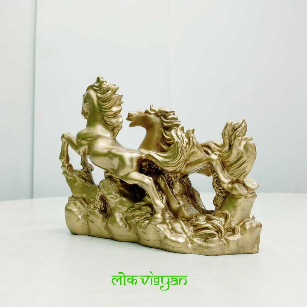 Gold statue of galloping horses