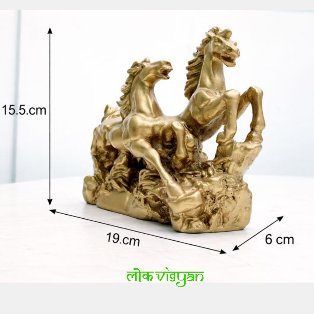 Gold statue of galloping horses